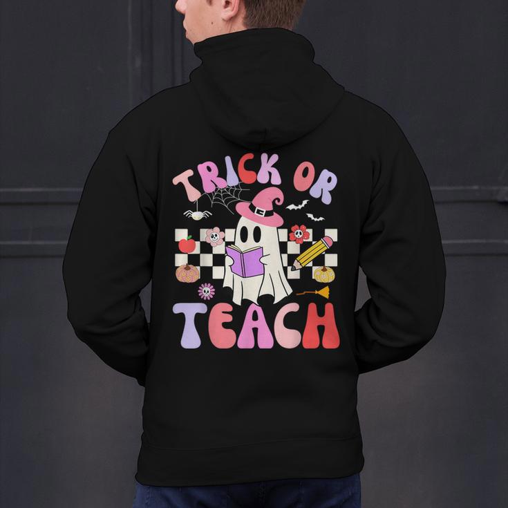 Trick Or Teach Halloween Teacher Floral Ghost Groovy Men's Hoodie Back Print, Groovy Teacher Hoodies, gift for family, gift for coworker