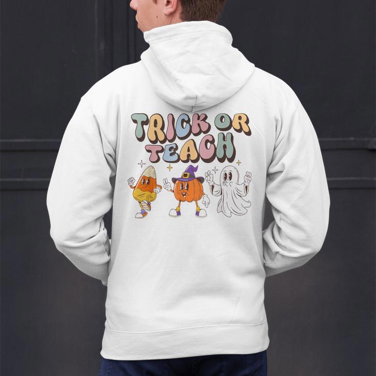 Trick Or Teach Candy Corn Pumpkin Ghost Teacher Men's Hoodie Back Print, gift for family, gift for coworker Trick Or Teach Candy Corn Pumpkin Ghost Teacher Men's Hoodie Back Print, gift for family, gift for coworker