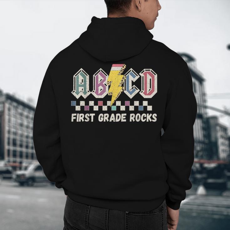 First Grade Rocks Teachers Back To School ABCD Rock Students Men's Hoodie Back Print, novelty gifts, funny gifts