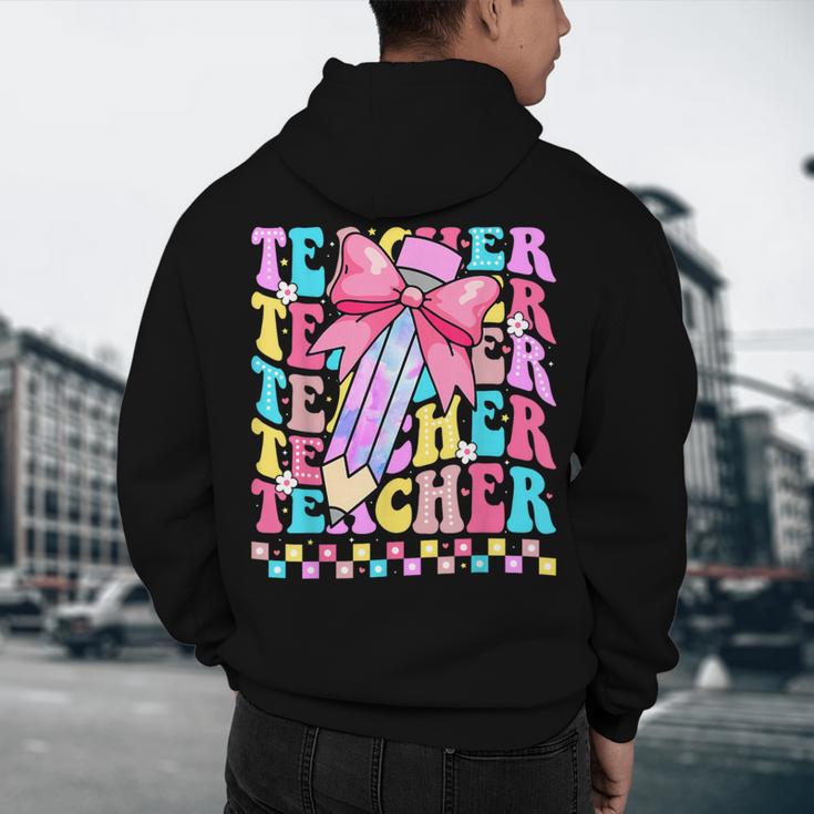 Groovy Teacher Cute Coquette Bow Flower Retro Back To School Men's Hoodie Back Print, novelty gifts, funny gifts