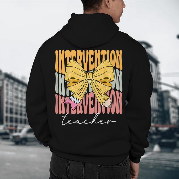 Interventionist Teacher Groovy Coquette Bow Back To School Men's Hoodie Back Print, novelty gifts, funny gifts