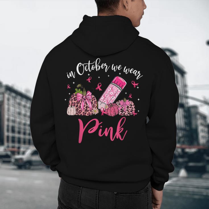 In October We Wear Pink Apple Teacher Daisy Breast Cancer Men's Hoodie Back Print, novelty gifts, funny gifts In October We Wear Pink Apple Teacher Daisy Breast Cancer Men's Hoodie Back Print, novelty gifts, funny gifts
