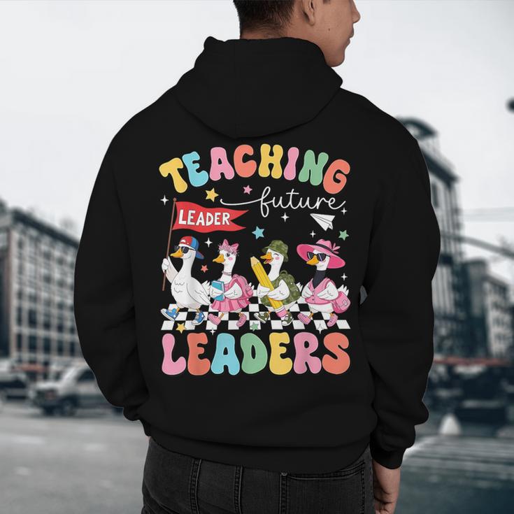 Teaching Future Leaders Groovy Teacher Back To School Men's Hoodie Back Print, novelty gifts, funny gifts