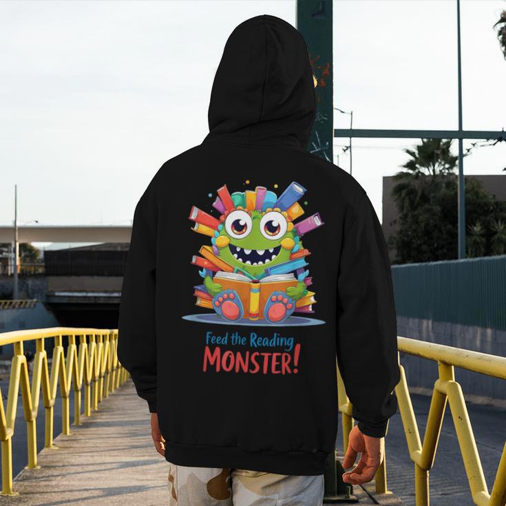 Feed The Reading Monster Halloween Teacher Men's Hoodie Back Print, funny design Feed The Reading Monster Halloween Teacher Men's Hoodie Back Print, funny design