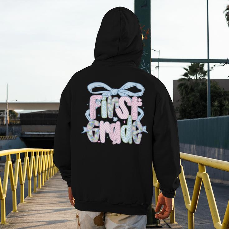 First Grade Coquette Bow Girls Teacher Team 1st Grade Squad Men's Hoodie Back Print, First Grade Teacher Gifts, funny design First Grade Coquette Bow Girls Teacher Team 1st Grade Squad Men's Hoodie Back Print, First Grade Teacher Gifts, funny design