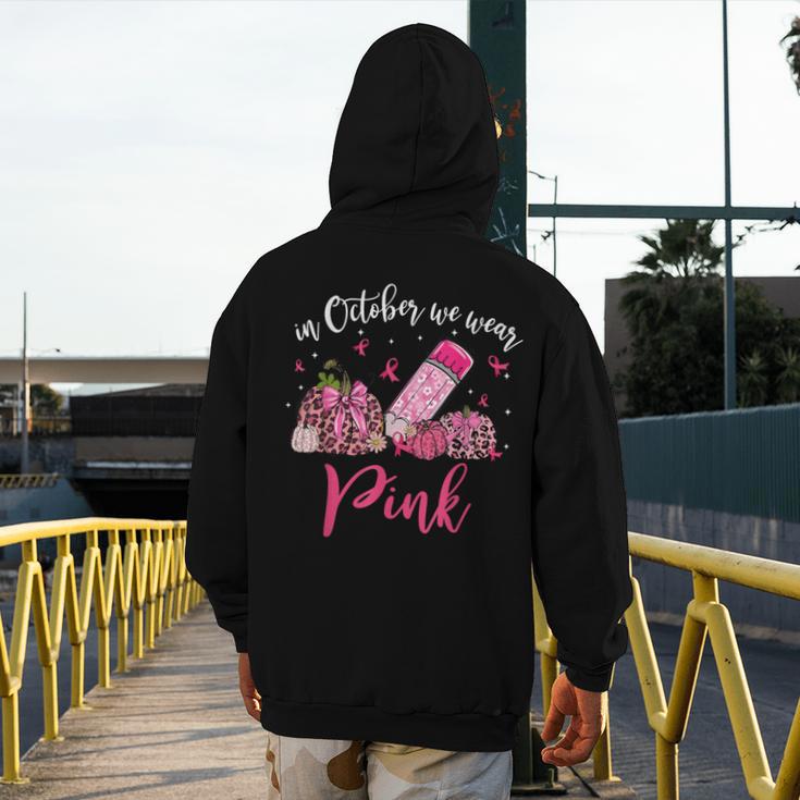 In October We Wear Pink Apple Teacher Daisy Breast Cancer Men's Hoodie Back Print, funny design In October We Wear Pink Apple Teacher Daisy Breast Cancer Men's Hoodie Back Print, funny design