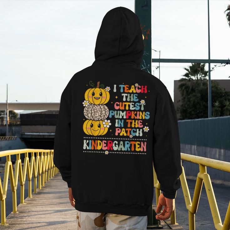 I Teach The Cutest Pumpkins Kindergarten Teacher Halloween Men's Hoodie Back Print, funny design
