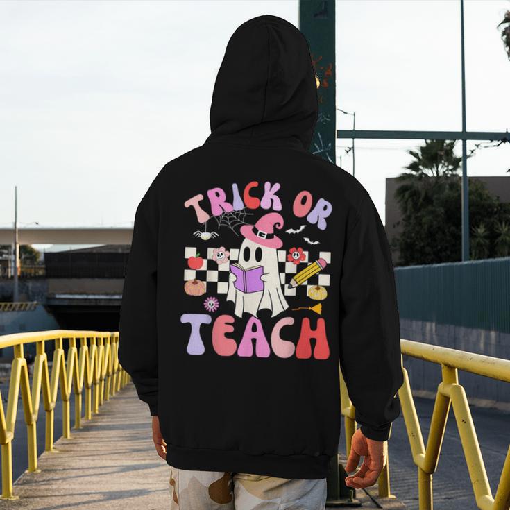 Trick Or Teach Halloween Teacher Floral Ghost Groovy Men's Hoodie Back Print, Groovy Teacher Gifts, funny design