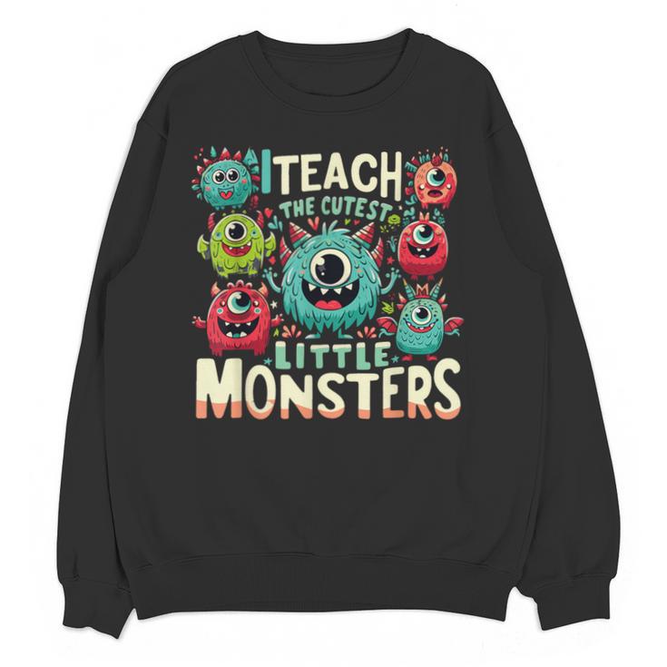 I Teach The Cutest Little Monsters Teacher Halloween Outfit Unisex Sweatshirt