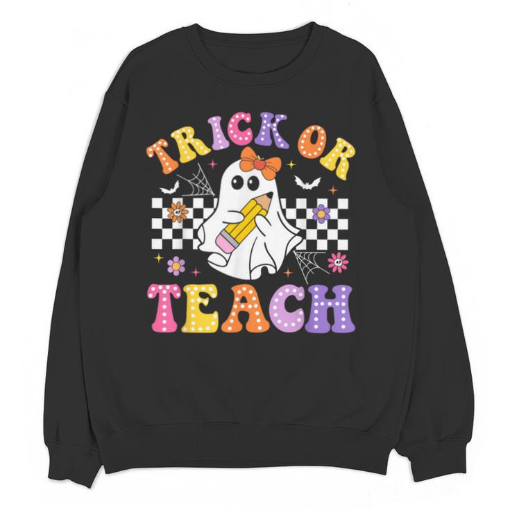 Trick Or Teach Groovy Halloween Teachers Unisex Sweatshirt