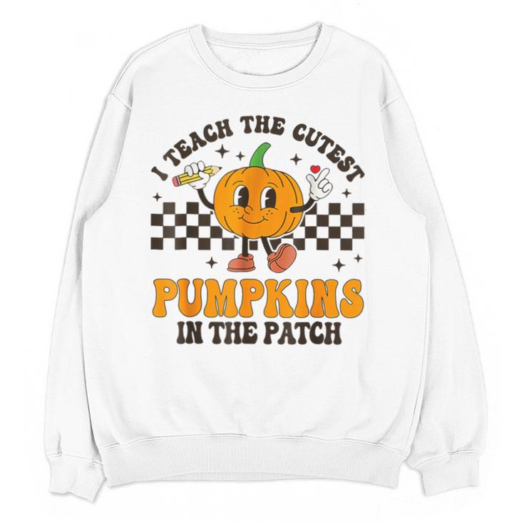 I Teach The Cutest Pumpkins In The Patch Groovy Teacher Fall Unisex Sweatshirt