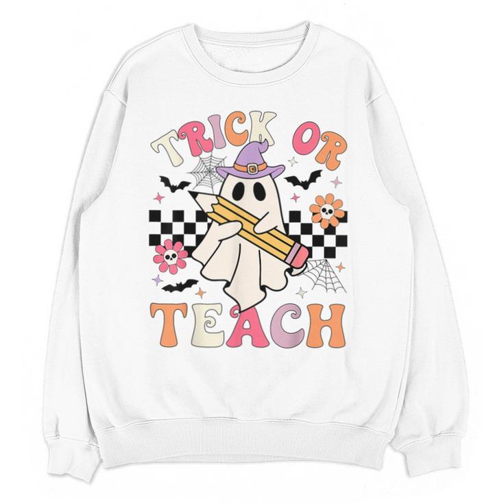 Trick Or Teach Groovy Teacher Halloween Retro Floral Ghost Unisex Sweatshirt