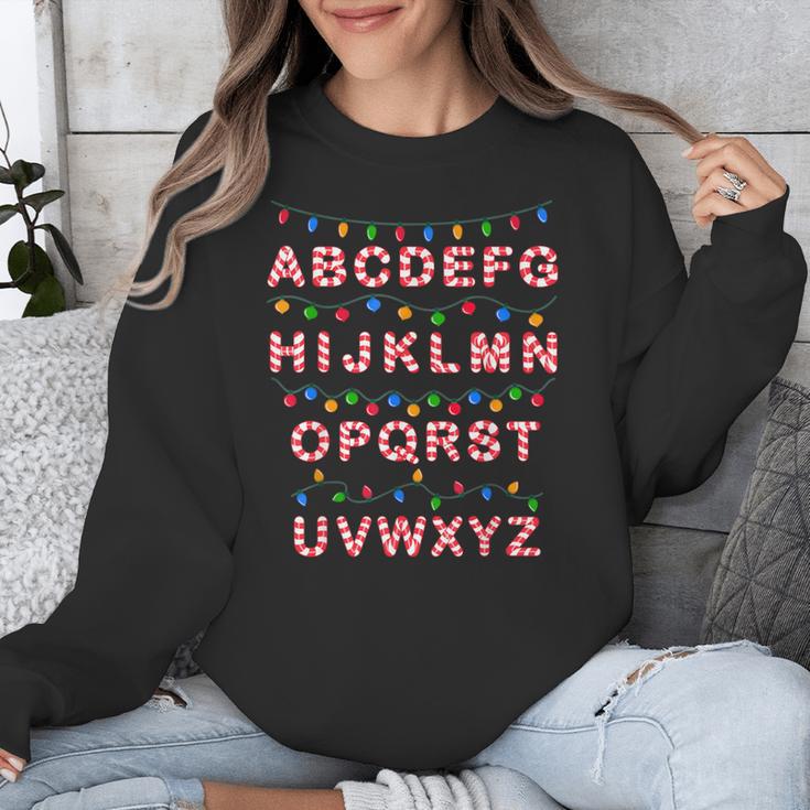 Christmas Alphabet Candy Cane Teachers Students Candy Cane For Men Women Kids Unisex Sweatshirt, funny design Christmas Alphabet Candy Cane Teachers Students Candy Cane For Men Women Kids Unisex Sweatshirt, funny design