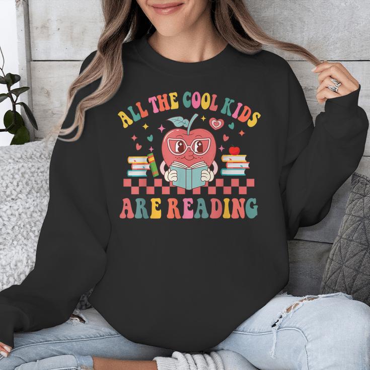 All The Cool Kids Are Reading Book Reading Teacher School Unisex Sweatshirt, funny design