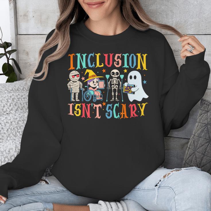 Cute Inclusion Isn't Scary Teacher Skeleton Ghost Halloween Unisex Sweatshirt, funny design Cute Inclusion Isn't Scary Teacher Skeleton Ghost Halloween Unisex Sweatshirt, funny design