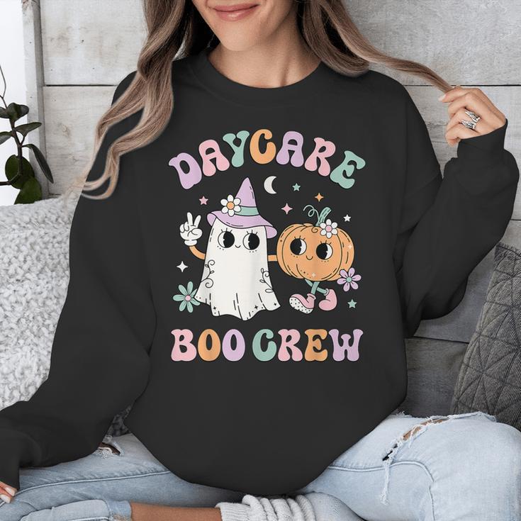 Daycare Boo Crew Groovy Halloween Floral Ghost Kid Teacher Unisex Sweatshirt, Groovy Teacher Gifts, funny design