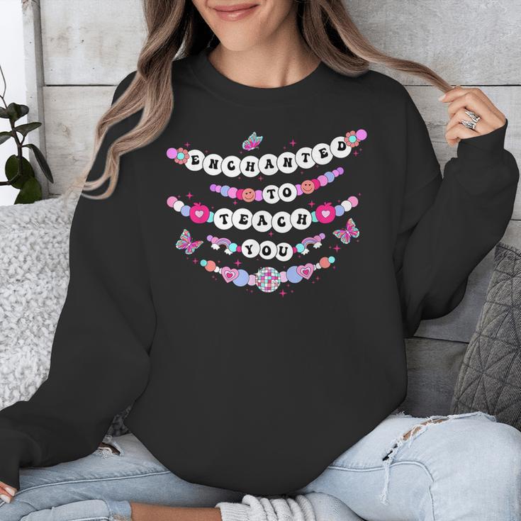 Enchanted To Teach You Bracelet Teacher Back To School Unisex Sweatshirt, funny design Enchanted To Teach You Bracelet Teacher Back To School Unisex Sweatshirt, funny design
