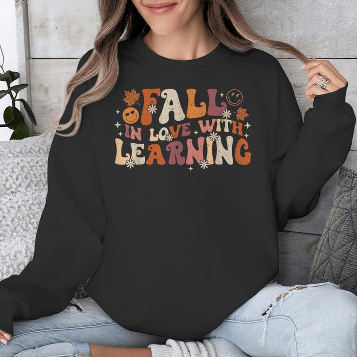 Fall In Love With Learning Autum Thanksgiving Teacher Kids Unisex Sweatshirt, funny design Fall In Love With Learning Autum Thanksgiving Teacher Kids Unisex Sweatshirt, funny design