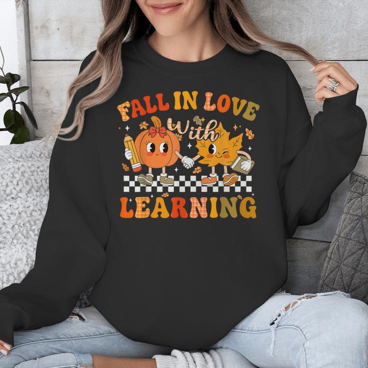 Fall In Love With Learning Autumn Pumpkin Fall Teacher Kids Unisex Sweatshirt, funny design Fall In Love With Learning Autumn Pumpkin Fall Teacher Kids Unisex Sweatshirt, funny design