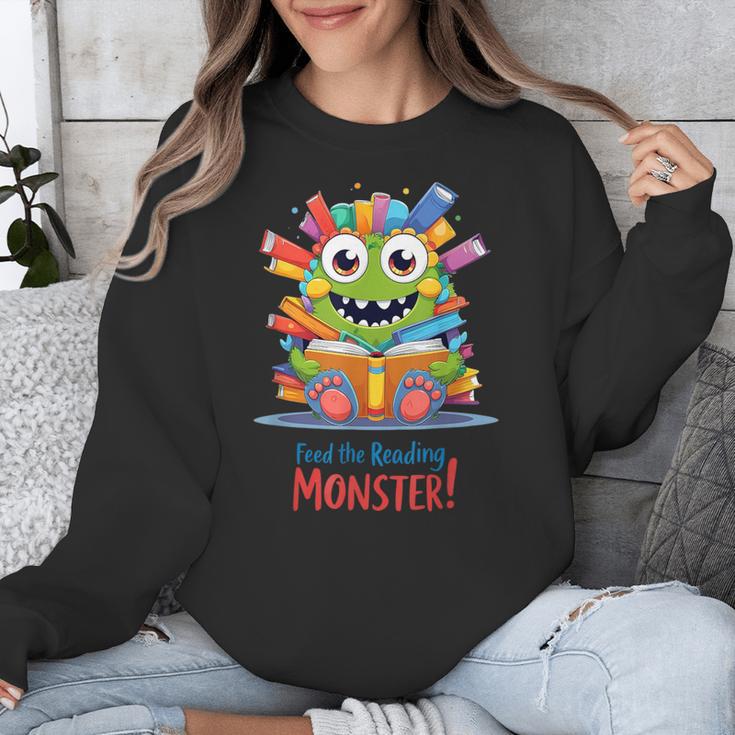 Feed The Reading Monster Halloween Teacher Unisex Sweatshirt, funny design Feed The Reading Monster Halloween Teacher Unisex Sweatshirt, funny design