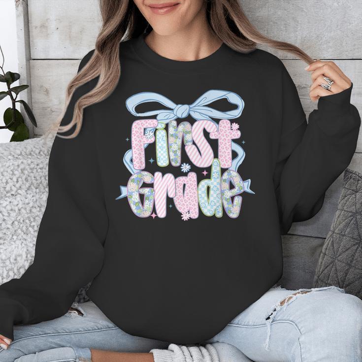 First Grade Coquette Bow Girls Teacher Team 1st Grade Squad Unisex Sweatshirt, First Grade Teacher Gifts, funny design