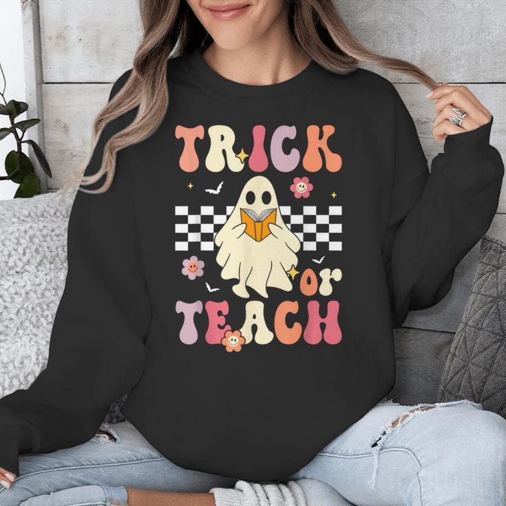 Groovy Teacher Halloween Retro Trick Or Teach Floral Ghost Unisex Sweatshirt, Groovy Teacher Gifts, funny design