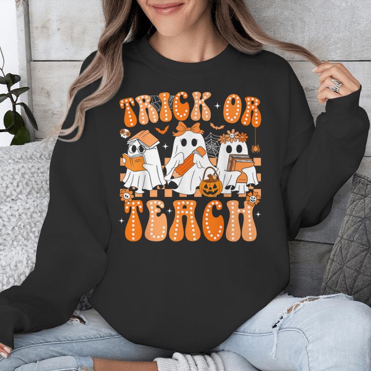 Groovy Teacher Halloween Trick Or Teach Ghost Men Women Kids Unisex Sweatshirt, Groovy Teacher Gifts, funny design Groovy Teacher Halloween Trick Or Teach Ghost Men Women Kids Unisex Sweatshirt, Groovy Teacher Gifts, funny design