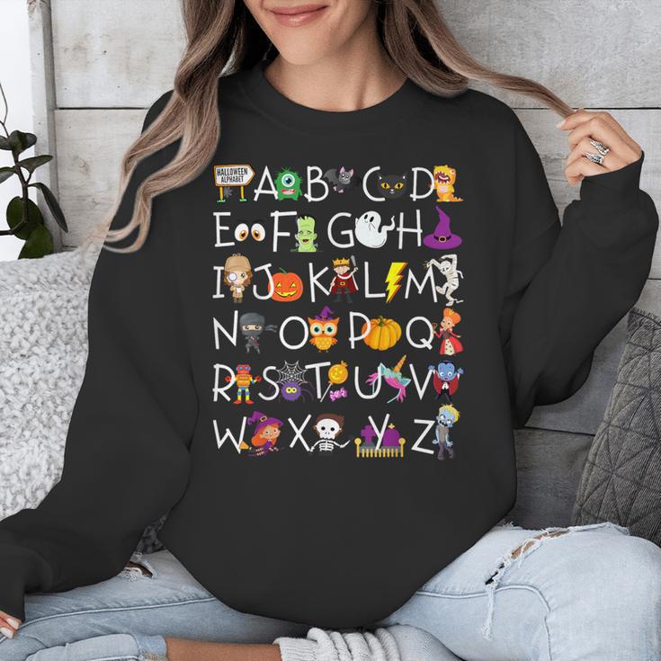 Halloween Nursery Teacher Shirt Halloween Alphabet Unisex Sweatshirt, funny design