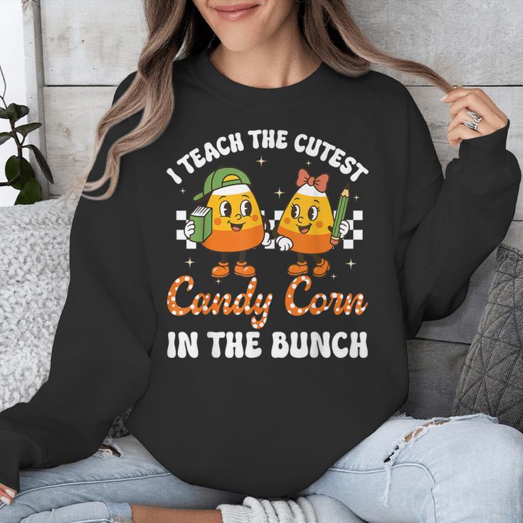 Halloween Teacher Cutest Candy Corn Groovy Spooky Teachers Unisex Sweatshirt, Groovy Teacher Gifts, funny design