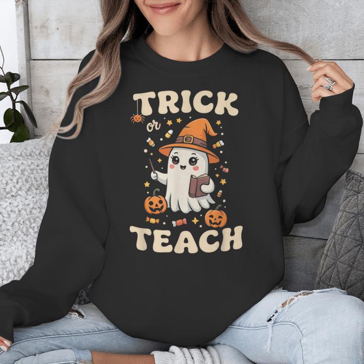 Halloween Teacher Shirts Women School Trick Or Teach Groovy Unisex Sweatshirt, Groovy Teacher Gifts, funny design Halloween Teacher Shirts Women School Trick Or Teach Groovy Unisex Sweatshirt, Groovy Teacher Gifts, funny design