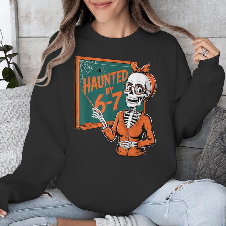 Haunted By 6-7 Six Seven 67 Math Teacher Halloween Skeleton Unisex Sweatshirt, funny design