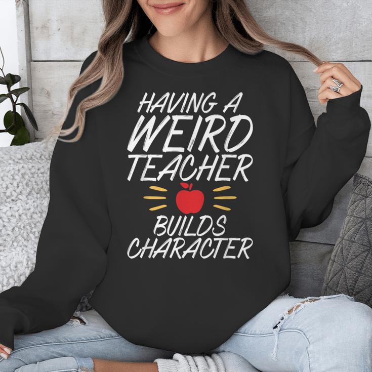 Having a Weird Teacher Builds Character School Teacher Unisex Sweatshirt, funny design Having a Weird Teacher Builds Character School Teacher Unisex Sweatshirt, funny design