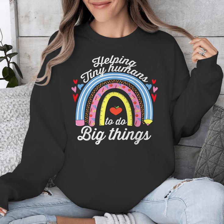 Helping Tiny Humans To Do Big Things Teacher Women Unisex Sweatshirt, funny design Helping Tiny Humans To Do Big Things Teacher Women Unisex Sweatshirt, funny design