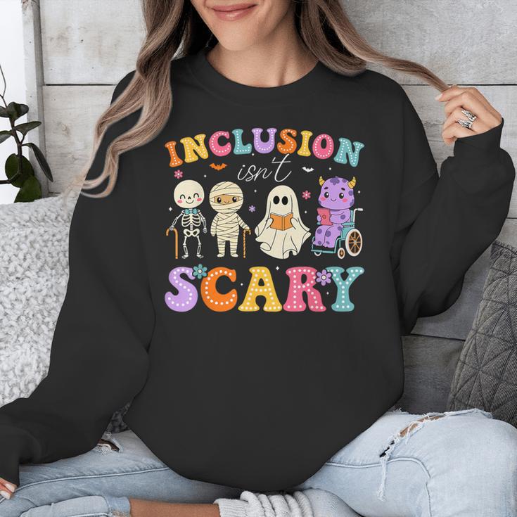 Inclusion Isn't Scary Ghost Halloween SLP Sped Teacher Unisex Sweatshirt, funny design Inclusion Isn't Scary Ghost Halloween SLP Sped Teacher Unisex Sweatshirt, funny design