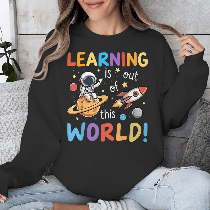 Learning Is Out Of This World Space Back To School Teacher Unisex Sweatshirt, funny design Learning Is Out Of This World Space Back To School Teacher Unisex Sweatshirt, funny design
