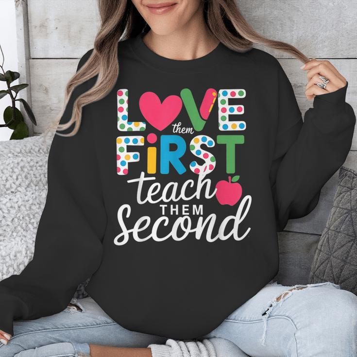 Love Them First Teach Them Second Teacher Student Love Quote Unisex Sweatshirt, funny design Love Them First Teach Them Second Teacher Student Love Quote Unisex Sweatshirt, funny design