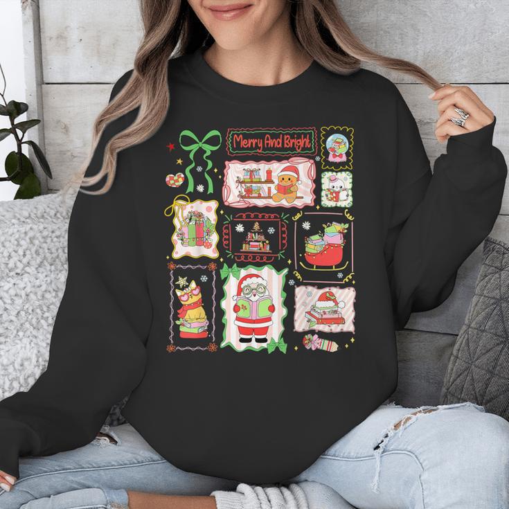 Merry And Bright Christmas Gingerbread Santa Book Teacher Unisex Sweatshirt, funny design Merry And Bright Christmas Gingerbread Santa Book Teacher Unisex Sweatshirt, funny design
