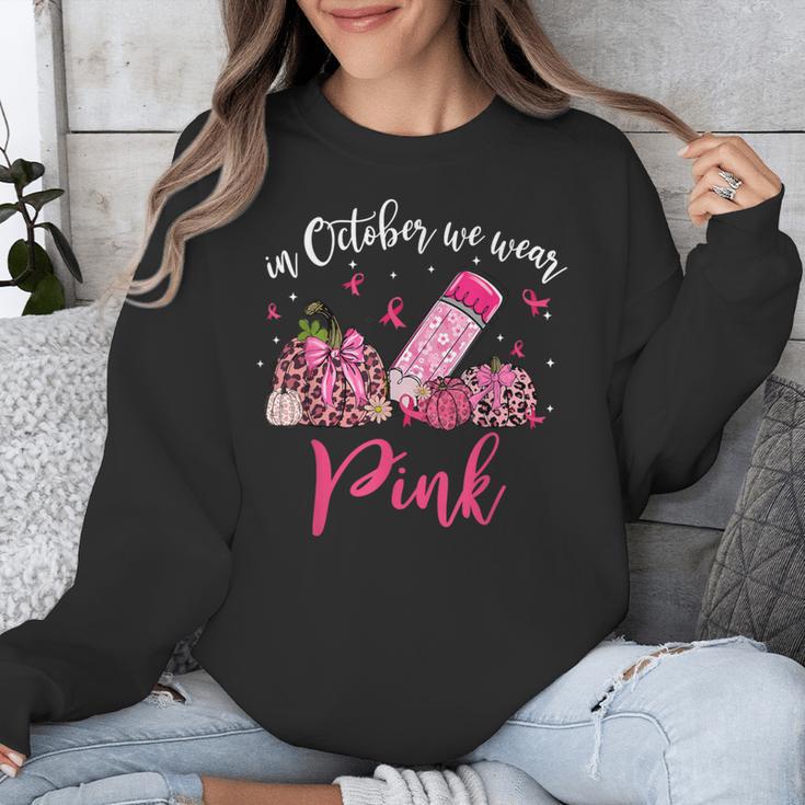 In October We Wear Pink Apple Teacher Daisy Breast Cancer Unisex Sweatshirt, funny design