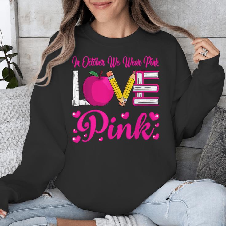In October We Wear Pink Love Teacher Breast Cancer Awareness Unisex Sweatshirt, funny design In October We Wear Pink Love Teacher Breast Cancer Awareness Unisex Sweatshirt, funny design