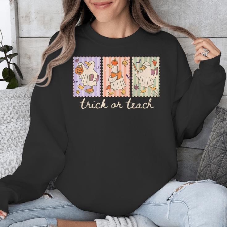 Preppy Goose Teacher Trick Or Teach Halloween Teacher Goose Unisex Sweatshirt, funny design