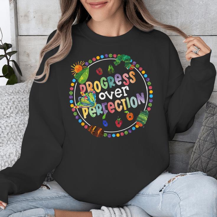 Progress Over Perfection Caterpillar Back To School Teacher Unisex Sweatshirt, funny design Progress Over Perfection Caterpillar Back To School Teacher Unisex Sweatshirt, funny design
