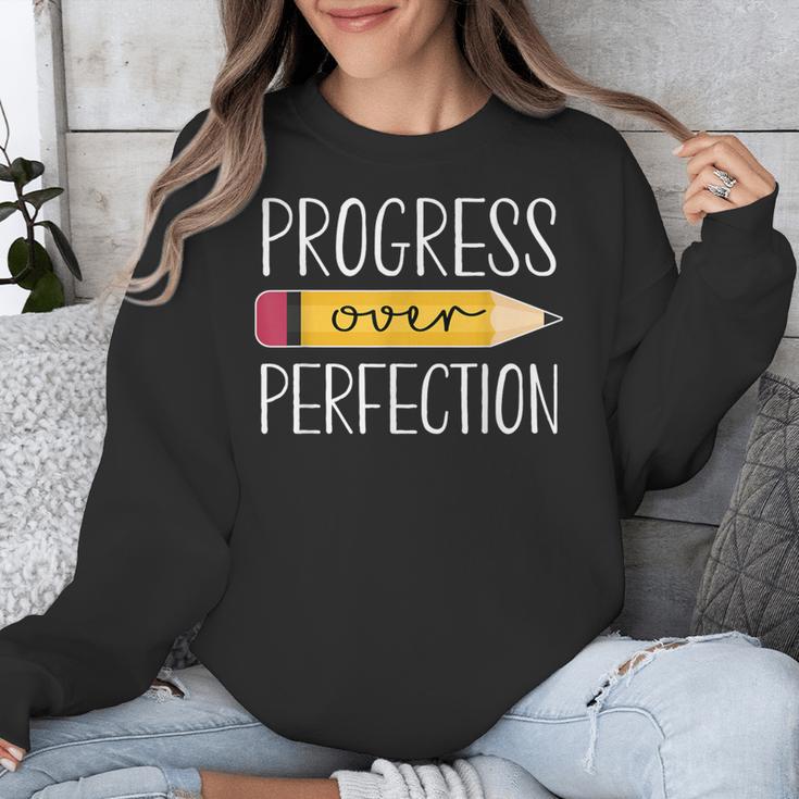 Progress Over Perfection Motivational Back To School Teacher Unisex Sweatshirt, funny design Progress Over Perfection Motivational Back To School Teacher Unisex Sweatshirt, funny design