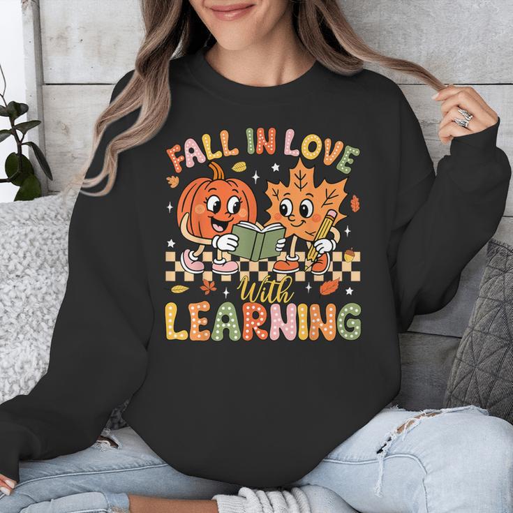 Retro Fall In Love With Learning Autumn Pumpkin Teacher Kids Unisex Sweatshirt, funny design Retro Fall In Love With Learning Autumn Pumpkin Teacher Kids Unisex Sweatshirt, funny design
