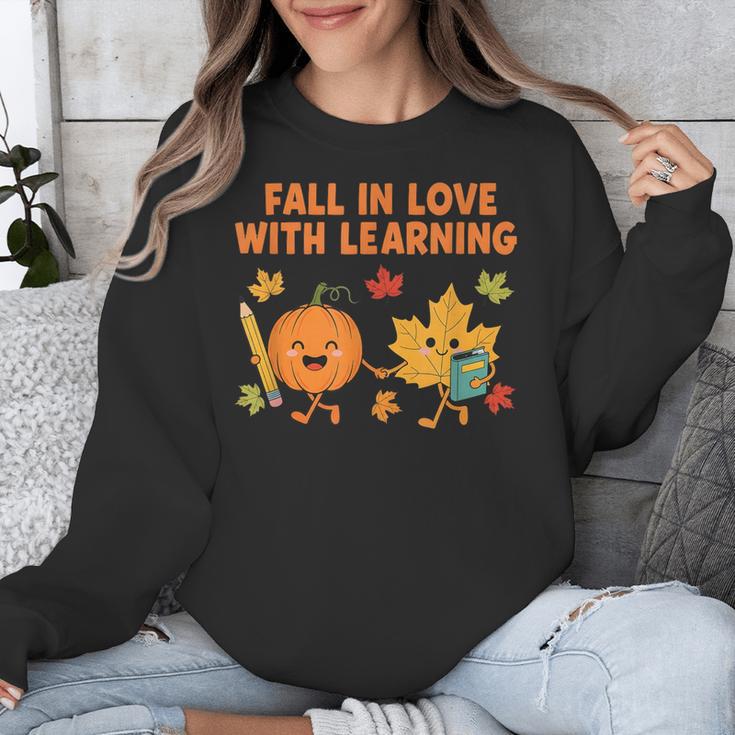 Retro Fall In Love With Learning Autumn Pumpkin Teacher Unisex Sweatshirt, funny design Retro Fall In Love With Learning Autumn Pumpkin Teacher Unisex Sweatshirt, funny design