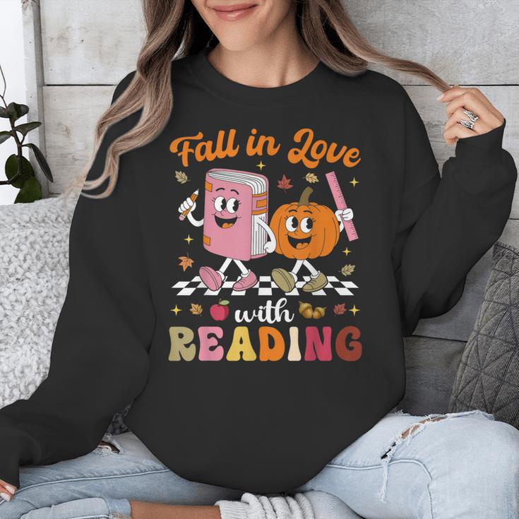 Retro Fall In Love With Learning Pumpkin Autumn Teacher Unisex Sweatshirt, funny design Retro Fall In Love With Learning Pumpkin Autumn Teacher Unisex Sweatshirt, funny design