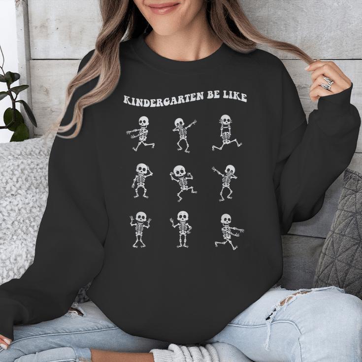 Retro Halloween Kindergarten Teacher Skeleton Trick Or Treat Men Women Kids Unisex Sweatshirt, funny design