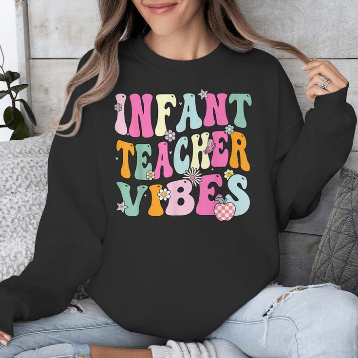 Retro Infant Teacher Vibes Women Daycare Teacher Unisex Sweatshirt, funny design Retro Infant Teacher Vibes Women Daycare Teacher Unisex Sweatshirt, funny design