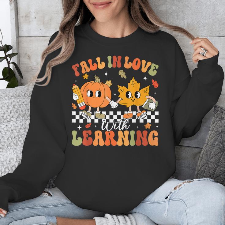 Retro Pumpkin Fall In Love With Learning Autumn Teacher Unisex Sweatshirt, funny design Retro Pumpkin Fall In Love With Learning Autumn Teacher Unisex Sweatshirt, funny design