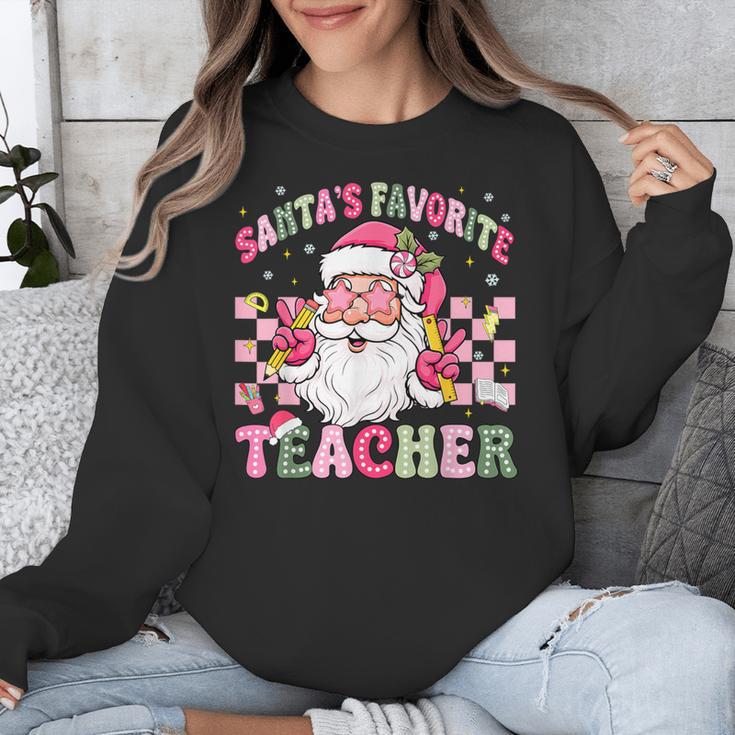 Santa's Favorite Teacher Groovy Christmas Teacher Boys Girls Unisex Sweatshirt, Groovy Teacher Gifts, funny design Santa's Favorite Teacher Groovy Christmas Teacher Boys Girls Unisex Sweatshirt, Groovy Teacher Gifts, funny design