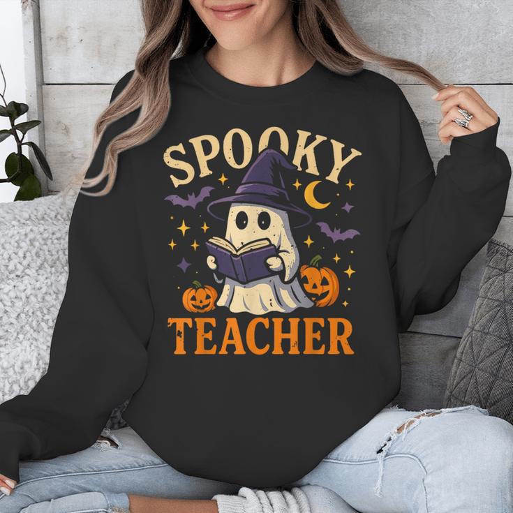 Spooky Teacher Halloween Cute Ghost Pumpkin Reading Women Unisex Sweatshirt, funny design Spooky Teacher Halloween Cute Ghost Pumpkin Reading Women Unisex Sweatshirt, funny design